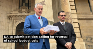 DA to submit petition calling for reversal of school budget cuts